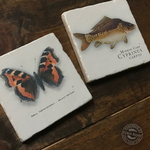 'A pair of Carp and Tortoiseshell Butterfly Tumbled Marble Coasters by simon royer.'