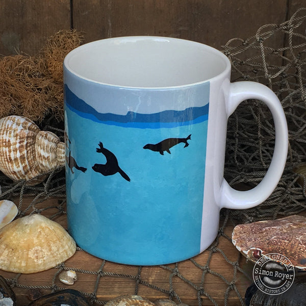 'Great White Shark and Fur Seals Ceramic Mug by simon royer.'