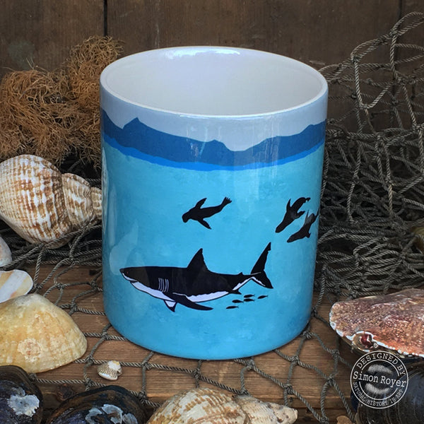 'Great White Shark and Fur Seals Ceramic Mug by simon royer.'