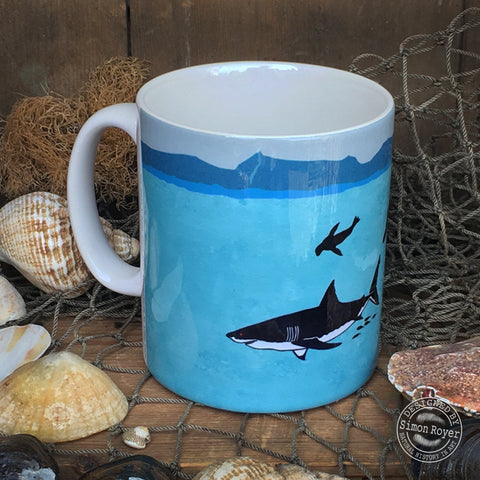 'Great White Shark and Fur Seals Ceramic Mug by simon royer.'