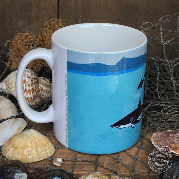 'Great White Shark and Fur Seals Ceramic Mug by simon royer.'