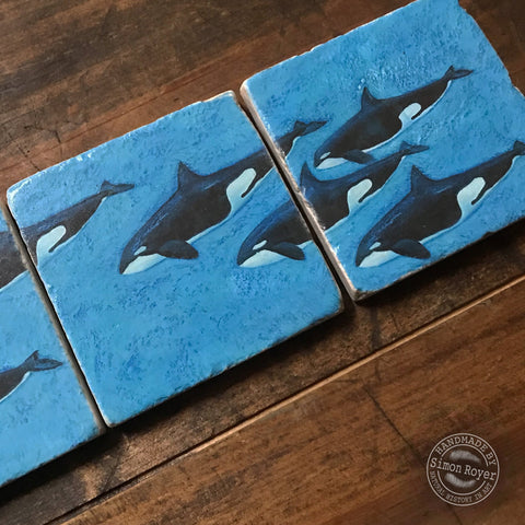 'Orca Pod Split Tumbled Marble Coasters by simon royer.'
