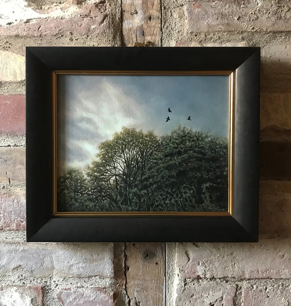 Framed oil painting of Crows above the trees by artist simon royer.